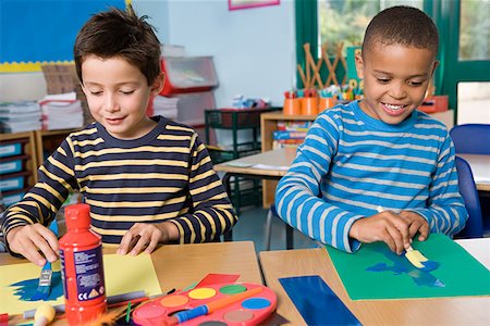 Two boys painting Stock Photo - Premium Royalty-Free, Code: 614-01171297