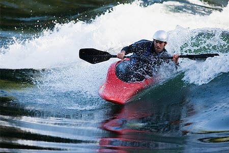 simsearch:614-01171527,k - Man kayaking on river Fotografie stock - Premium Royalty-Free, Codice: 614-01171515