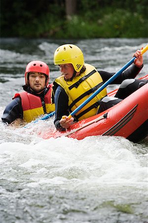 simsearch:614-01171527,k - Two people white water rafting Fotografie stock - Premium Royalty-Free, Codice: 614-01171527