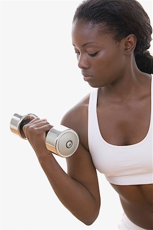 Woman weight training Stock Photo - Premium Royalty-Free, Code: 614-01238150