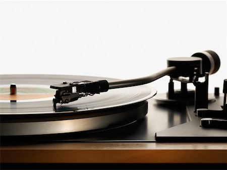 Record on turntable Foto de stock - Royalty Free Premium, Número: 614-01434015