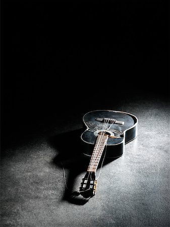 shadow acoustic guitar - Smashed guitar Stock Photo - Premium Royalty-Free, Code: 614-01433920