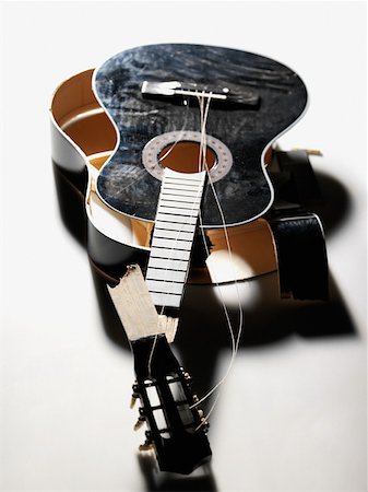 shadow acoustic guitar - Smashed guitar Stock Photo - Premium Royalty-Free, Code: 614-01433957