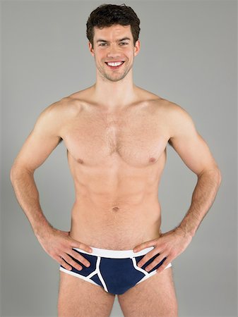 Man in his underwear Stock Photo - Premium Royalty-Free, Code: 614-01486500