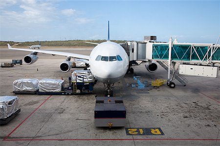 plane runway people - Preparing airplane Stock Photo - Premium Royalty-Free, Code: 614-01487806