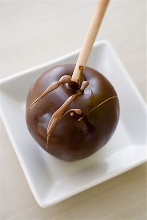 simsearch:614-02258138,k - A chocolate covered apple Stock Photo - Premium Royalty-Free, Code: 614-01588395