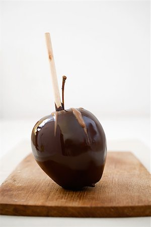 simsearch:614-02258138,k - A chocolate covered apple Stock Photo - Premium Royalty-Free, Code: 614-01588409