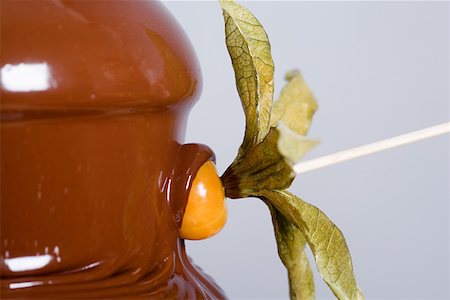 simsearch:614-02258138,k - A kumquat covered in chocolate Stock Photo - Premium Royalty-Free, Code: 614-01588414