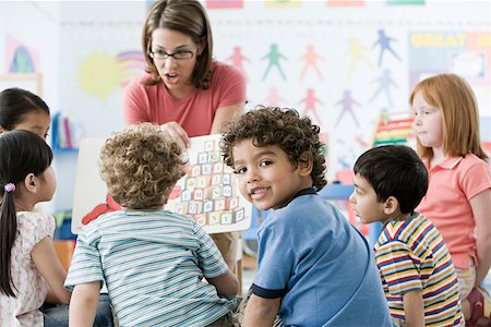 preschool teacher - A teacher with children Stock Photo - Premium Royalty-Free, Code: 614-01634728