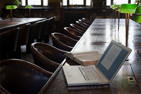 Laptop computer in a traditional library Stock Photo - Premium Royalty-Free, Code: 614-01635545