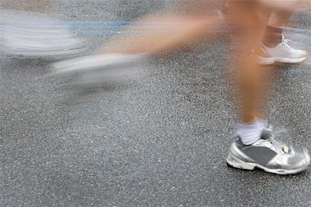 running feet - Runners Stock Photo - Premium Royalty-Free, Code: 614-01633431