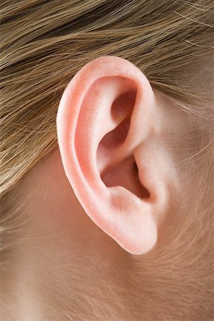 Close up of a womans ear Foto de stock - Royalty Free Premium, Número: 614-01758828