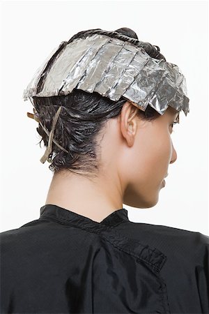 foil highlights - A woman having her hair dyed Stock Photo - Premium Royalty-Free, Code: 614-01819280