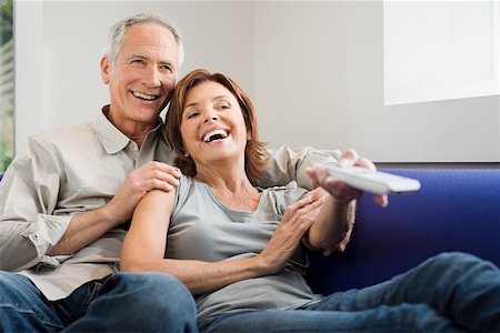 simsearch:614-03784139,k - A couple watching tv Stock Photo - Premium Royalty-Free, Code: 614-01820401