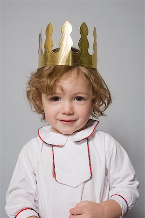 Boy in a party hat Stock Photo - Premium Royalty-Free, Code: 614-01821366