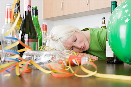 drucken - Woman sleeping after a party Stock Photo - Premium Royalty-Free, Code: 614-01869225
