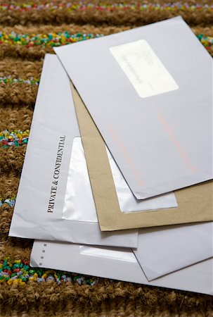 envelope (package) - Mail on a doormat Stock Photo - Premium Royalty-Free, Code: 614-01869602