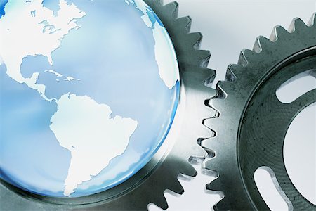 Planet earth and machine cogs Stock Photo - Premium Royalty-Free, Code: 614-01869643