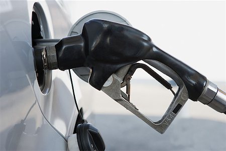 fuel filling - A petrol tank being filled Stock Photo - Premium Royalty-Free, Code: 614-01869678