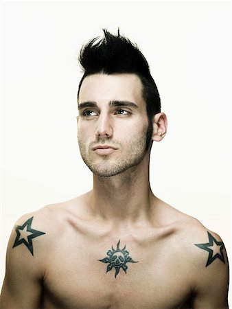 portrait tattoos for men - Young man with tattoos Foto de stock - Sin royalties Premium, Código: 614-01869871