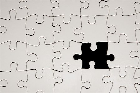 Jigsaw puzzle with missing piece Stock Photo - Premium Royalty-Free, Code: 614-02048560