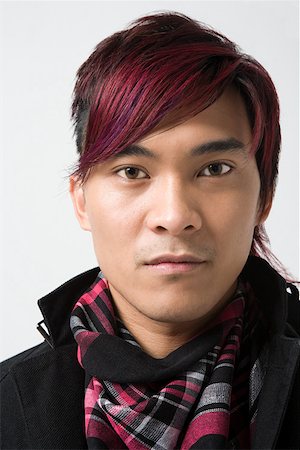 Young japanese man with dyed hair Stock Photo - Premium Royalty-Free, Code: 614-02049465