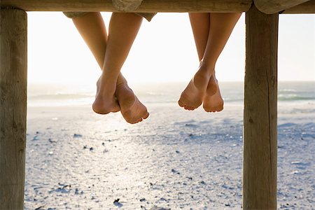 Barefeet and a pier Stock Photo - Premium Royalty-Free, Code: 614-02049749