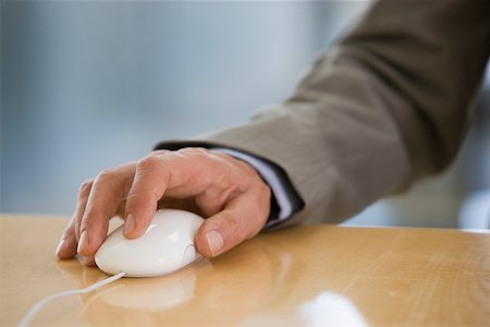 ratón - Businessman using a mouse Foto de stock - Sin royalties Premium, Código: 614-02050077