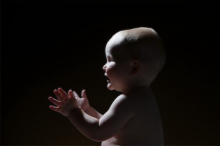 A baby boy clapping Foto de stock - Sin royalties Premium, Código: 614-02050183