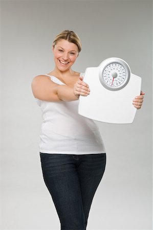 Overweight Fat Woman On The Weight Scale Stock Photo, Picture and Royalty  Free Image. Image 11259411.