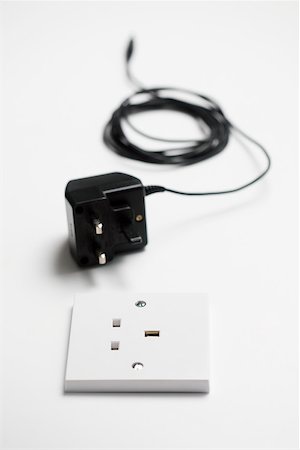 Charger and socket Stock Photo - Premium Royalty-Free, Code: 614-02073090