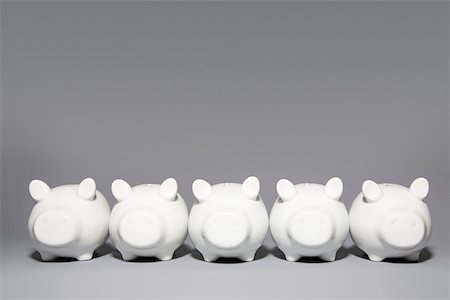 five objects - Five piggybanks in a row Stock Photo - Premium Royalty-Free, Code: 614-02244279