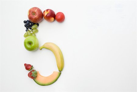 Fruit in the shape of the number five Stock Photo - Premium Royalty-Free, Code: 614-02240508