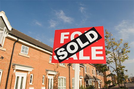 sold - Sold sign and houses Stock Photo - Premium Royalty-Free, Code: 614-02240600