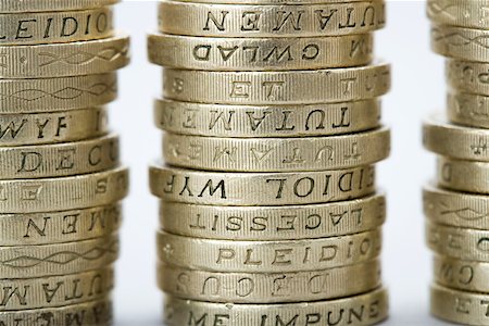 piles of cash pounds - Stacks of pound coins Stock Photo - Premium Royalty-Free, Code: 614-02240715