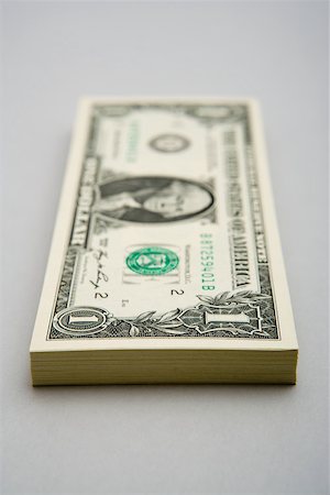 simsearch:614-00397700,k - Stack of dollar bills Foto de stock - Sin royalties Premium, Código: 614-02240712