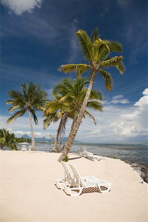 french polynesia - Sun lounger on a beach in tahiti Stock Photo - Premium Royalty-Free, Code: 614-02240805
