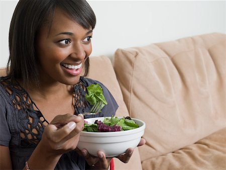 Young woman with salad Stock Photo - Premium Royalty-Free, Code: 614-02241400