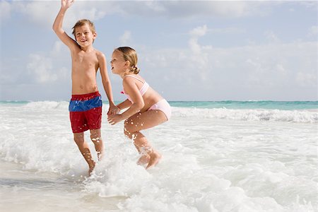 Children playing in the sea Stock Photo - Premium Royalty-Free, Code: 614-02242088