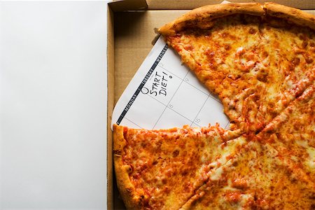 pizza box nobody - A pizza and a calendar saying start diet Stock Photo - Premium Royalty-Free, Code: 614-02242221
