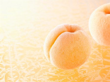 peach color - Frozen apricots Stock Photo - Premium Royalty-Free, Code: 614-02242312