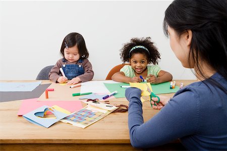 simsearch:614-02242718,k - A woman supervising girls drawing Stock Photo - Premium Royalty-Free, Code: 614-02242683