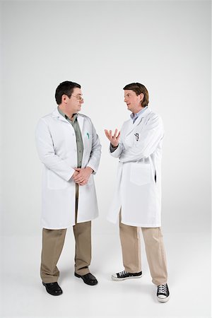 scientist white coat full body - Scientists having discussion Stock Photo - Premium Royalty-Free, Code: 614-02242877