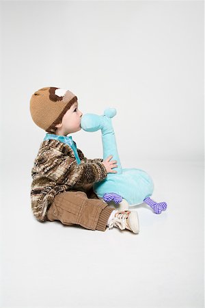 A boy and a soft toy Stock Photo - Premium Royalty-Free, Code: 614-02243193