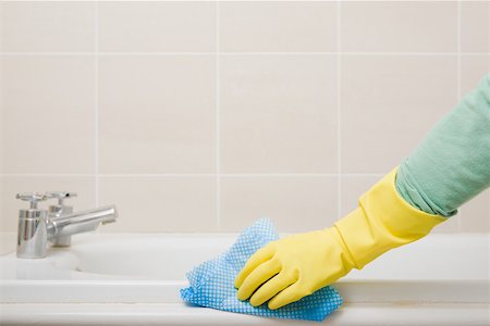 rubber glove - Person cleaning bath Stock Photo - Premium Royalty-Free, Code: 614-02243914