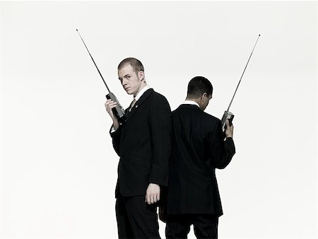Hommes avec talkies-walkies Photographie de stock - Premium Libres de Droits, Code: 614-02259040