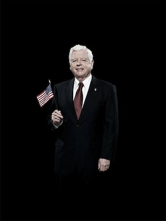 president (male) - Politician with american flag Stock Photo - Premium Royalty-Free, Code: 614-02259051