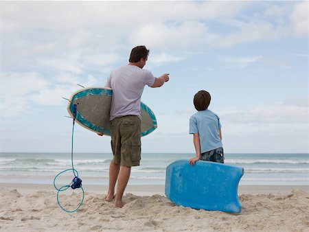 family surfboards photography - Father and son with surfboard and bodyboard Stock Photo - Premium Royalty-Free, Code: 614-02259403