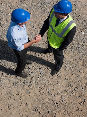people, shake hand, industry - Engineers shaking hands Stock Photo - Premium Royalty-Free, Code: 614-02259616