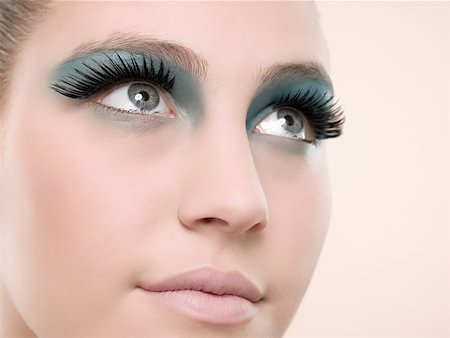 eye shadow - A young woman wearing false eyelashes Stock Photo - Premium Royalty-Free, Code: 614-02343536